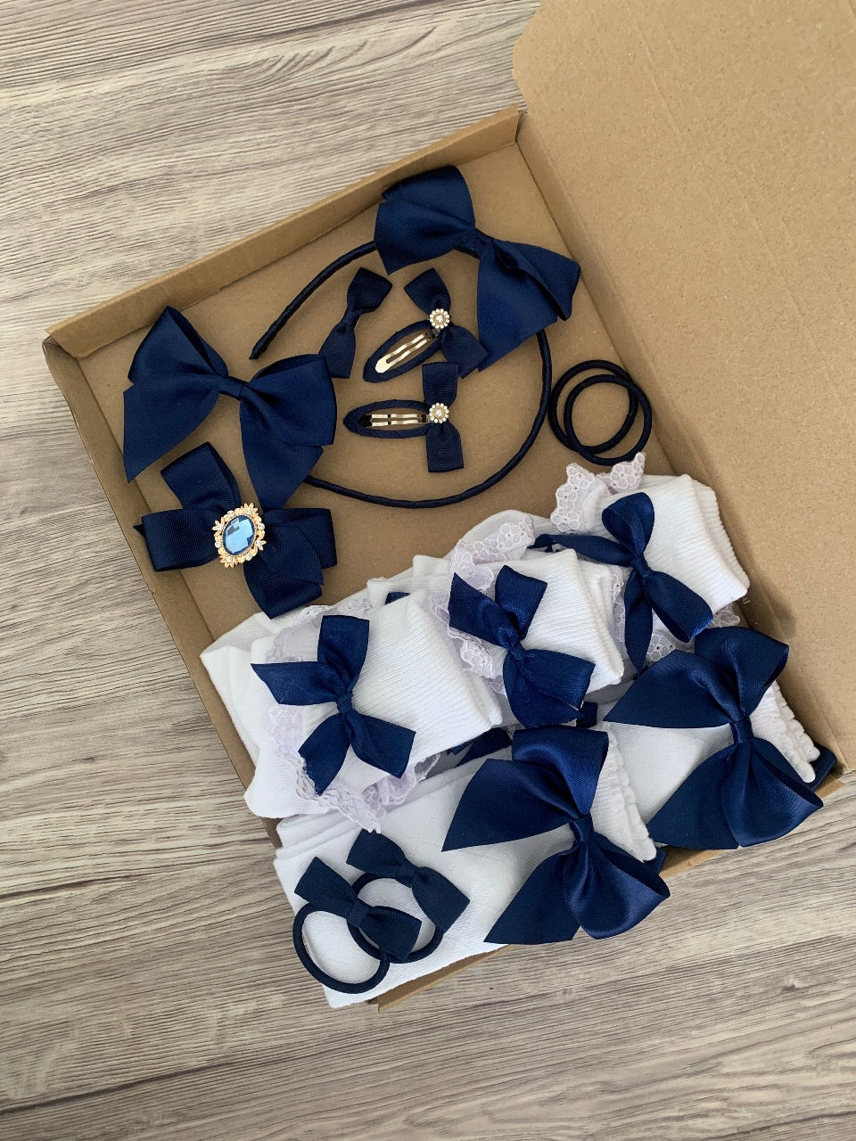 School box of bows and socks