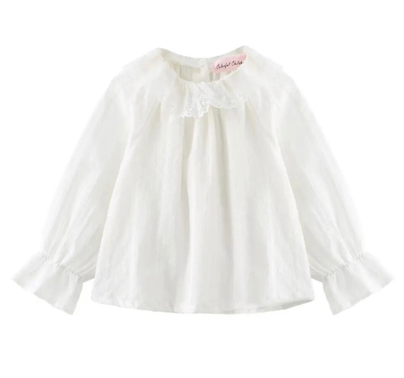 White ruffle shirt