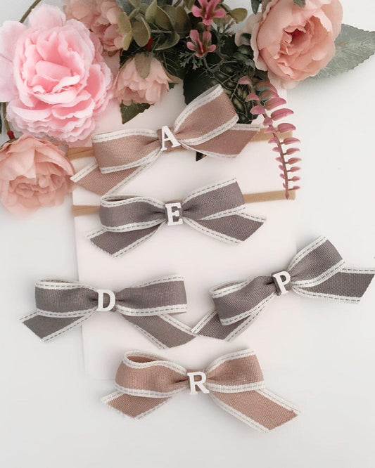 initial ribbon bow